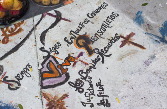Messages written on the sidewalk by an altar for Luis Gongora Pat, who was fatally shot by SFPD officers on April 7, 2016. Residents gathered for a press conference at the shooting location 6 months later on October 7. Photo: Patricio Guillamon