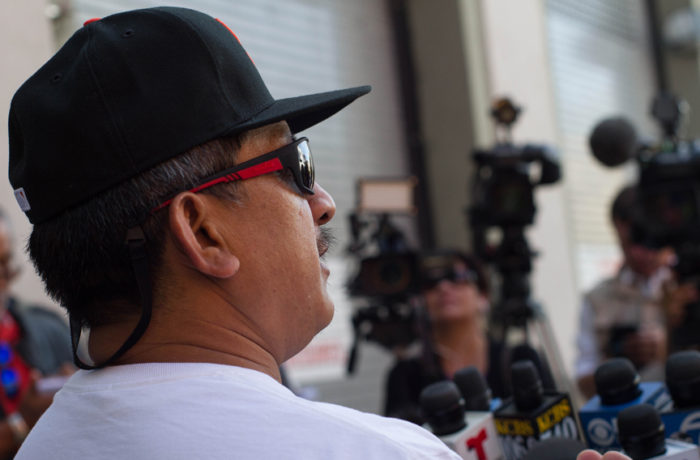 Luis Poot Pat, cousin of Luis Gongora Pat, who was shot by SFPD on April 7, addresses the media on Oct. 7 at a press conference on 19th Street near Shotwell Street, the location of Gongora’s shooting. Photo: Patricio Guillamon