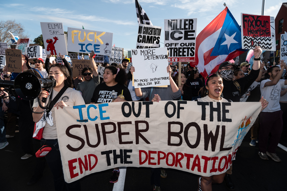 Super Bowl photos: Hundreds protest Trump’s immigration crackdown